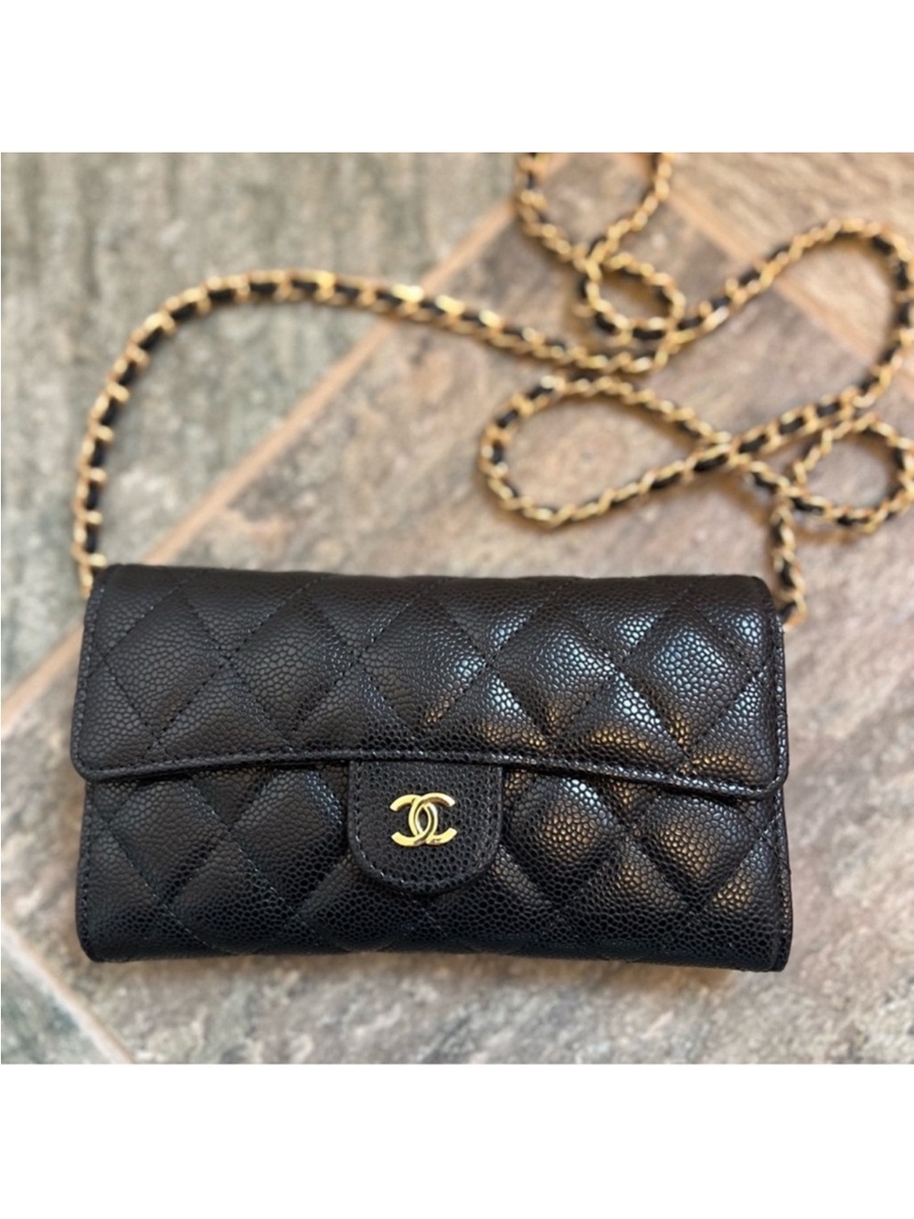 NEW with dust bag. Gorgeous detail, and gold hardware!